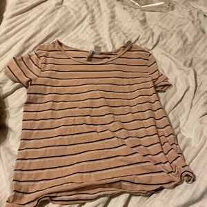 light pink background with black and white stripes.